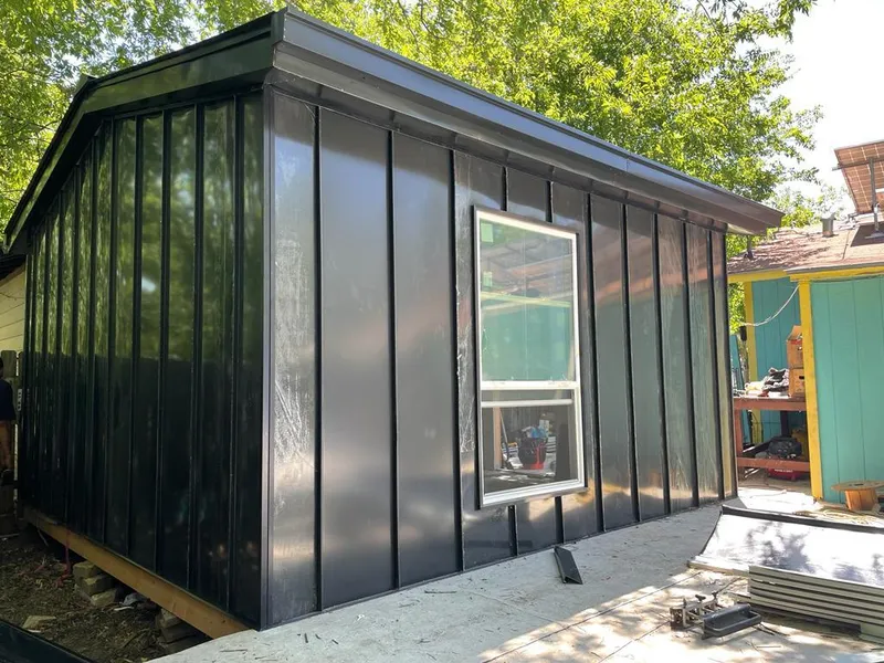 Black standing seam metal wall panels for Roof Inspection in Red Bank